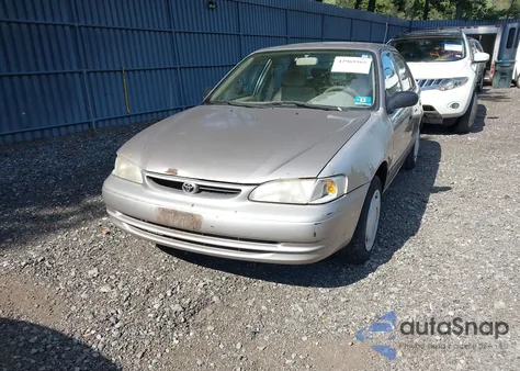 1999 Toyota Corolla Ce from USA, damaged, VIN 2T1BR12E1XC141396